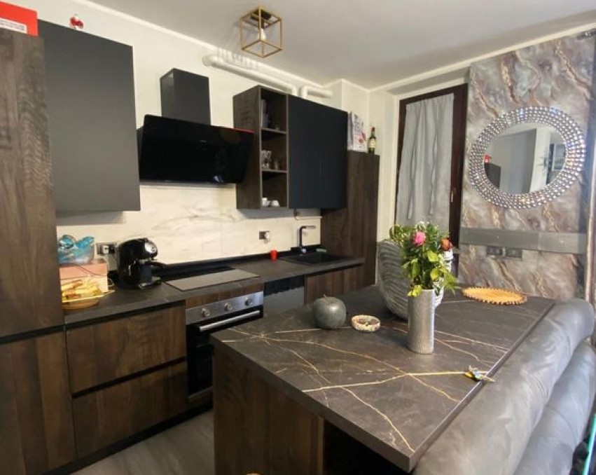 Renovated one-bedroom apartment with private garden and garage